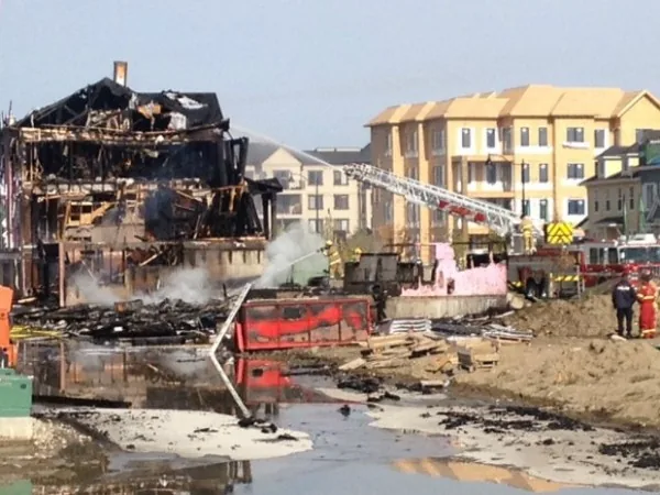 Fire damaged units at the McKenzie Towne construction site