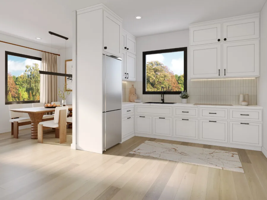 Modern kitchen with white cabinetry, stainless steel appliances, and a window overlooking autumn trees. (4 of 5)