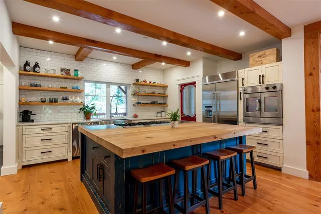 The living room and custom kitchen at Mountainside Paradise