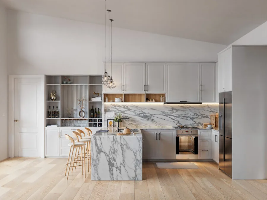 Modern white kitchen with marble island, stainless steel appliances, and wooden bar seating overlooking open living area. (3 of 4)