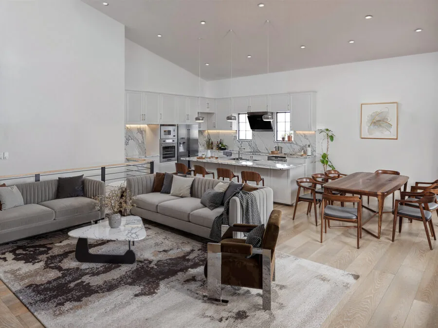 Modern open-concept living space with gray sectional sofa, dining table, and kitchen with marble backsplash (4 of 5)