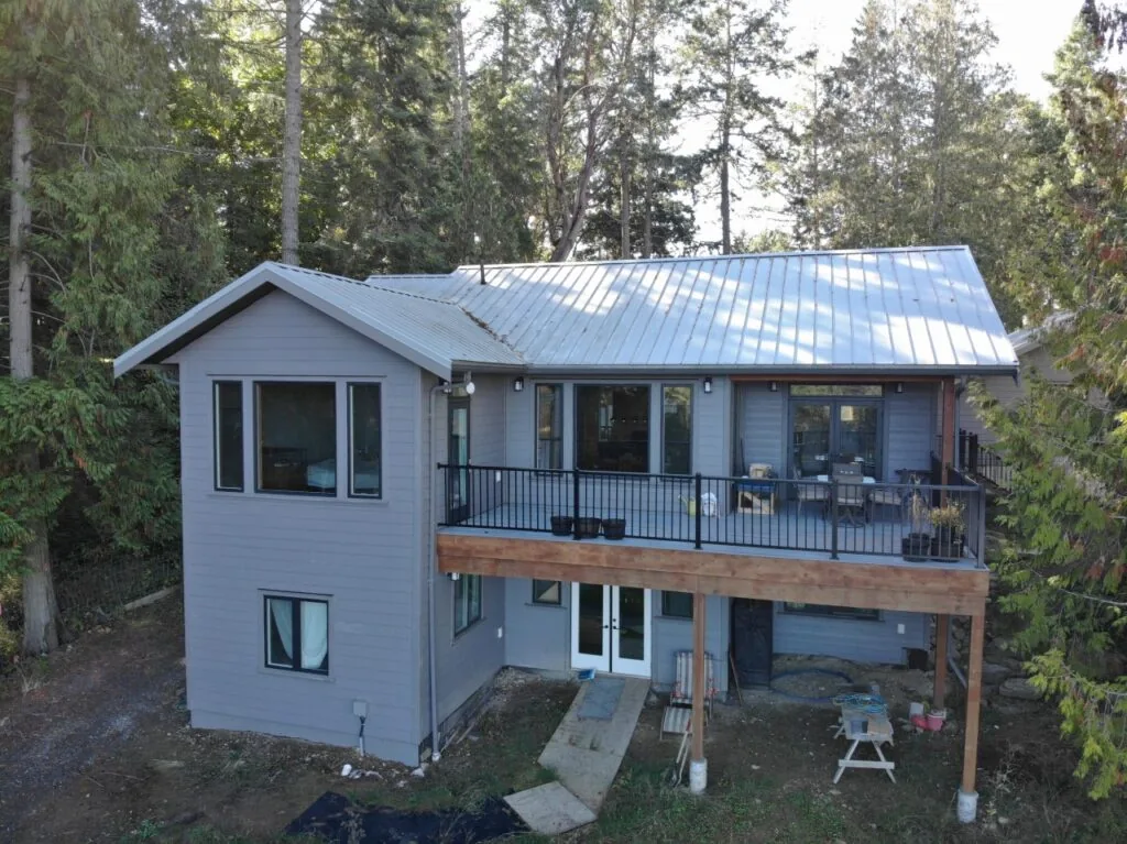 Back view of the recently completed home, highlighting its deck space.