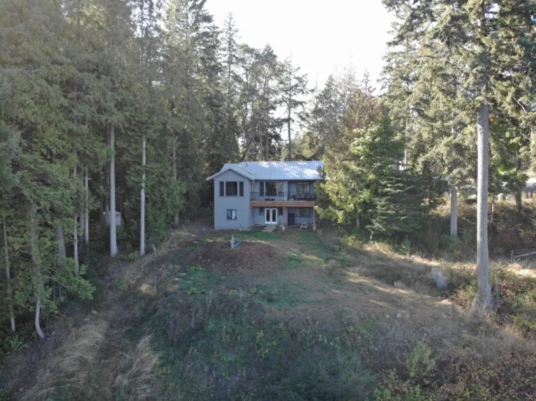 A distant view of the new, custom built home