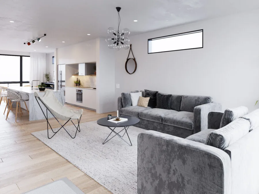Modern open-plan apartment with gray sectional sofa, dining area, kitchen, and large windows throughout. (3 of 5)