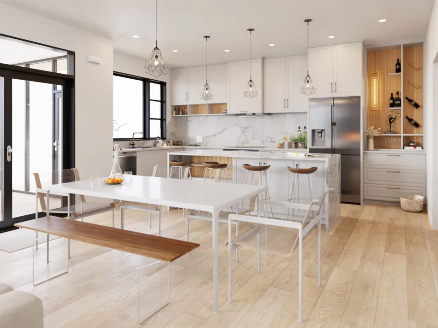 Modern kitchen with white cabinetry, marble backsplash, stainless steel appliances, and a dining table with bench seating. (3 of 4)