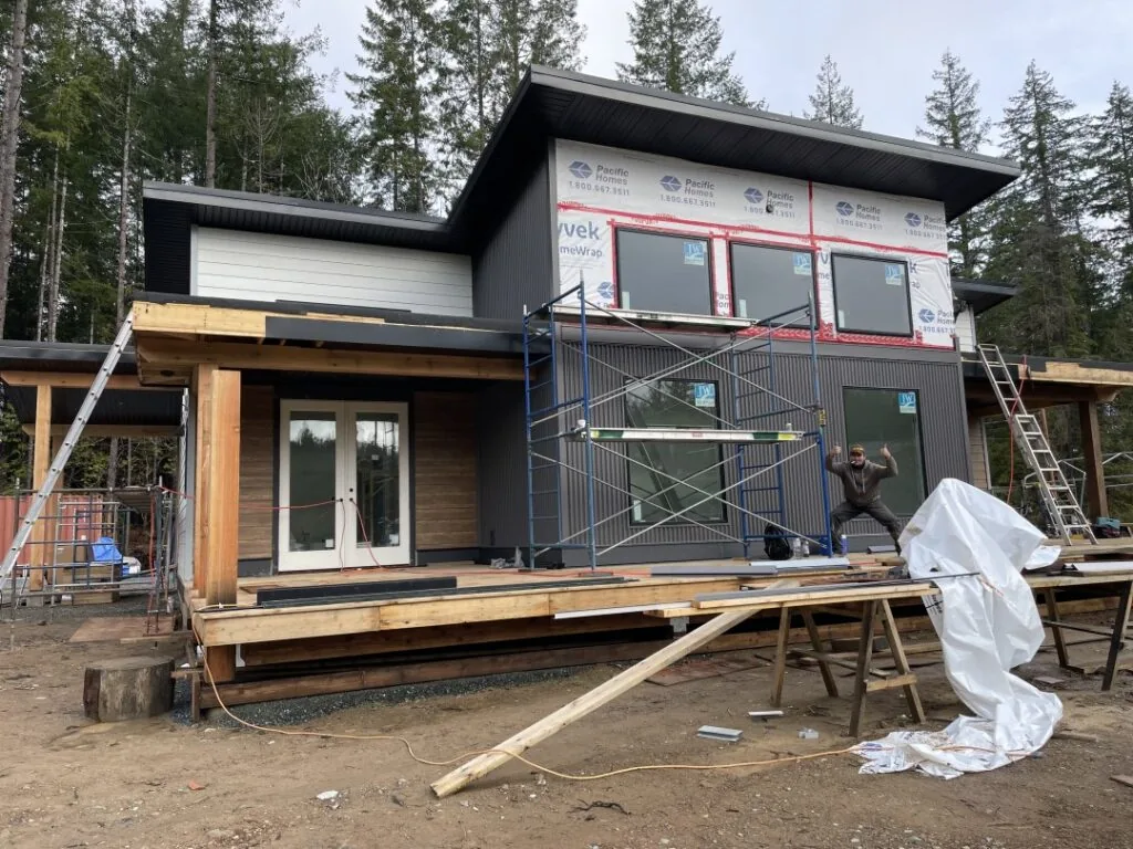 This modern house plan is coming to life and is nearly complete